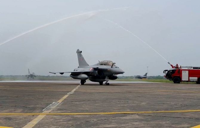 Water salute being given to the Rafale fighter aircraft after their landing at Indian Air Force airbase in Ambala. Photograph: ANI Photo